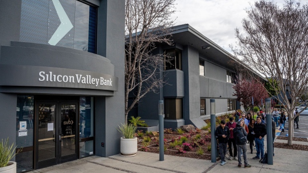 Customers in line outside Silicon Valley Bank headquarters in Santa Clara, California, US, on Monday, March 13, 2023. The collapse of Silicon Valley Bank has prompted a global reckoning at venture capital and private equity firms, which found themselves suddenly exposed all together to the tech industry's money machine.