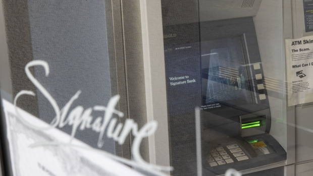 An automatic teller machine (ATM) at a Signature Bank branch in the Brooklyn borough of New York, US, on Wednesday, March 15, 2023. Signature’s collapse on Sunday was the third-largest bank failure in the US ever, behind Washington Mutual in 2008 and Silicon Valley Bank’s cataclysmic drop days ago. Photographer: Angus Mordant/Bloomberg