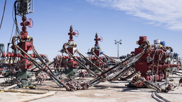 Machinery used to fracture shale formations stands at a Royal Dutch Shell Plc hydraulic fracking site near Mentone, Texas, U.S., on Thursday, March 2, 2017.