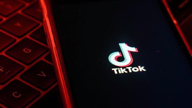 The logo for ByteDance Ltd.'s TikTok app is arranged for a photograph on a smartphone in Hong Kong, China, on Tuesday, July 7, 2020. TikTok, which has Chinese owners, announced it would pull its viral video app from Hong Kong's mobile stores in the coming days even as President Donald Trump threatened to ban it in the U.S. Photographer: Bloomberg/Bloomberg