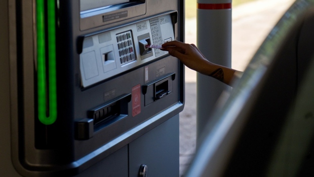 A customer uses a drive-thru automated teller machine (ATM) at a Bank of America Corp. branch in San Antonio, Texas, U.S., on Thursday, July 12, 2018. Bank of America Corp. is scheduled to release earnings figures on July 16. Photographer: Callaghan O'Hare/Bloomberg
