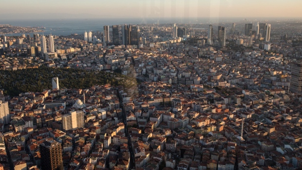 Residential and commercial buildings stand on the city skyline seen from the Istanbul Sapphire observation deck in Istanbul, Turkey, on Monday, Aug. 13, 2018. President Recep Tayyip Erdogan vowed to boycott iPhones in a demonstration of defiance as the U.S. held firm to its demand that Turkey release an evangelical pastor and Turkish executives called for action to bolster the lira. Photographer: Nicole Tung/Bloomberg