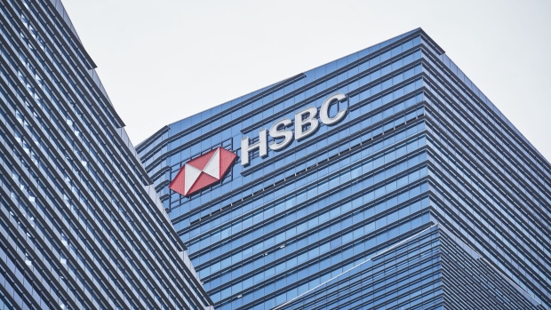 Signage for HSBC Holdings Plc headquarters is displayed on the building that houses its headquarters in the central business district (CBD) of Singapore, on Thursday, Jan. 28, 2021. HSBC plans to accelerate its expansion across Asia in its imminent strategy refresh, Chairman Mark Tucker told the virtual Asian Financial Forum last week. Photographer: Lauryn Ishak/Bloomberg