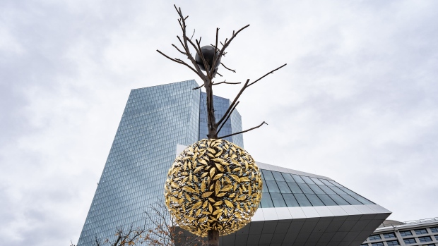 A bronze and granite tree-shaped sculpture entitled Gravity and Growth stands outside the European Central Bank (ECB) headquarters in Frankfurt, Germany, on Wednesday, Nov. 27, 2019. ECB President Christine Lagarde said "support for the euro has reached an all-time high". Photographer: Peter Juelich/Bloomberg