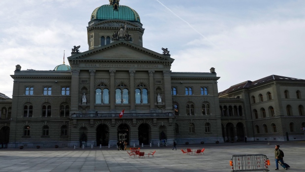 The Federal Palace, Switzerland's parliament building, in Bern, Switzerland, on Thursday, March 16, 2023. Credit Suisse tapped the Swiss National Bank for as much as 50 billion francs ($54 billion) and offered to repurchase debt, seeking to stem a crisis of confidence that has sent shockwaves across the global financial system.