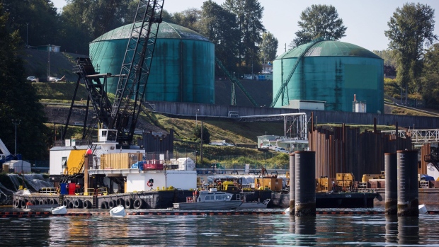 Oil storage tanks sit at the end of the Trans Mountain pipeline in Burnaby, British Columbia. Photographer: Darryl Dyck/Bloomberg