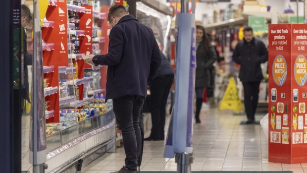 A shopper browses goods inside a J Sainsbury Plc supermarket in Guildford, UK, on Tuesday, Jan. 10, 2023. Sainsbury's are due to release a trading update on Wednesday.
