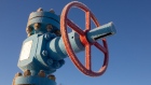 A valve control wheel connected to crude oil pipework in an oilfield near Dyurtyuli, in the Republic of Bashkortostan, Russia, on Thursday, Nov. 19, 2020. The flaring coronavirus outbreak will be a key issue for OPEC+ when it meets at the end of the month to decide on whether to delay a planned easing of cuts early next year. Photographer: Andrey Rudakov/Bloomberg
