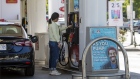 A customer refuels at a Petro-Canada gas station in Toronto, Ontario, Canada, on Friday, July, 29, 2022. A strategic review led by activist investor Elliott Management may lead to a sale of Suncor's retail segment.
