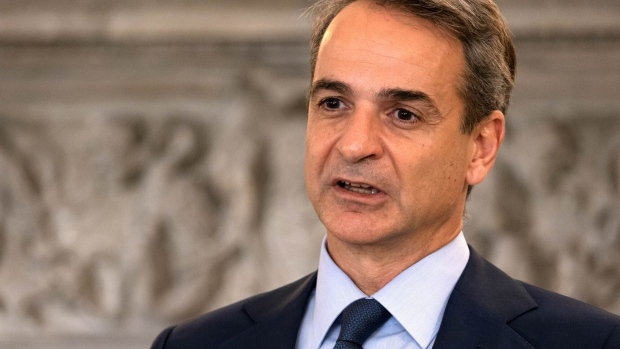 Kyriakos Mitsotakis, Greece's prime minister, speaks during a joint news conference with Olaf Scholz, Germany's chancellor, at Maximos Mansion in Athens, Greece, on Thursday, Oct. 27, 2022. Greece is planning to send the German tanks it receives as part of a military deal to support Ukraine close to its border with Turkey.