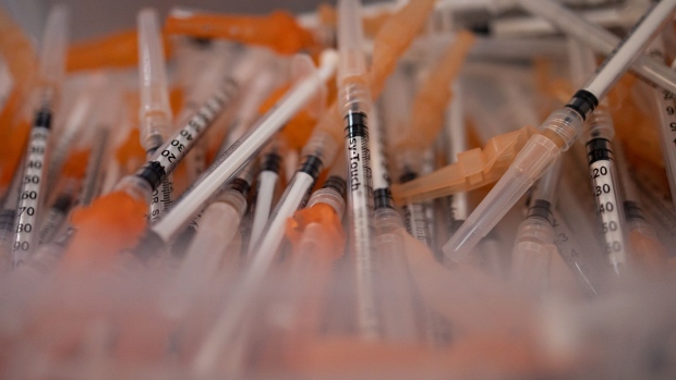 A container of syringes used to administer the Novavax Covid-19 vaccine at a pharmacy in Schwenksville, Pennsylvania, US, on Monday, Aug. 1, 2022. Novavax's protein-based Covid-19 vaccine received long-sought US emergency-use authorization in July, but use is likely to be limited. Photographer: Hannah Beier/Bloomberg