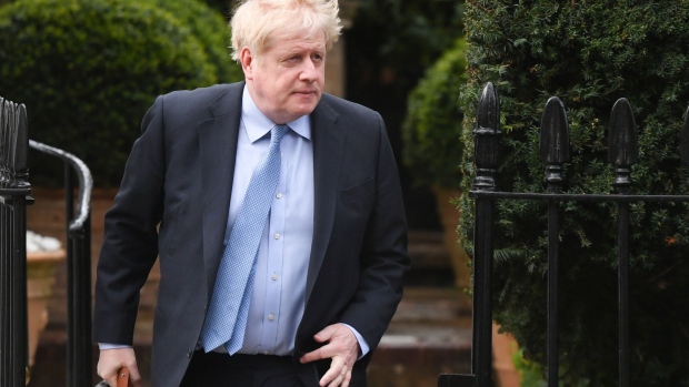 Boris Johnson, former UK prime minister, departs from his home in London, UK, on Wednesday, March 22, 2023. Johnson — the man who became prime minister thanks to Brexit — will seek to save his reputation by giving evidence to a committee investigating whether he deliberately lied to lawmakers over “Partygate,” a series of lockdown-busting gatherings held in Downing Street during the pandemic.