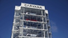 Vehicles sit inside a Carvana Co. car vending machine in Westminster, California, U.S., on Thursday, May 28, 2020. Used-vehicle prices are bouncing back from last month's lows and approaching J.D. Power's pre-pandemic forecasts, a welcome development for ailingautomakersand rental-car companies.