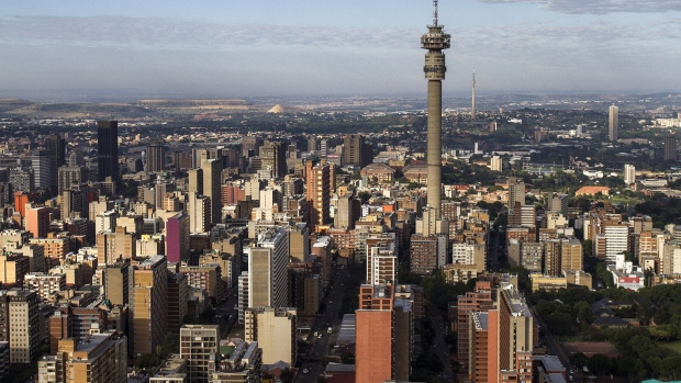 The Hillbrow Telkom tower stands amongst commercial and residential property on the city skyline in this aerial view of Johannesburg, South Africa. Photographer: Dean Hutton