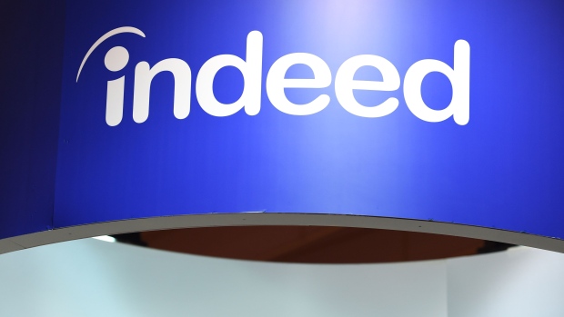 A logo above the Indeed booth on day two of the Web Summit in Lisbon, Portugal, on Thursday, Nov. 3, 2022. The Web Summit runs from 1-4 November. Photographer: Zed Jameson/Bloomberg