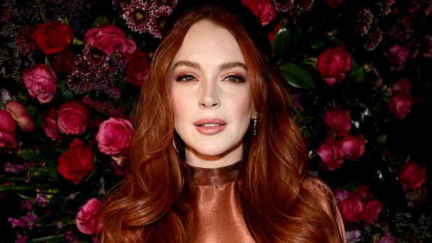 NEW YORK, NEW YORK - FEBRUARY 09: Lindsay Lohan attends the Christian Siriano Fall/Winter 2023 NYFW Show at Gotham Hall on February 09, 2023 in New York City. (Photo by Jamie McCarthy/Getty Images for Christian Siriano)