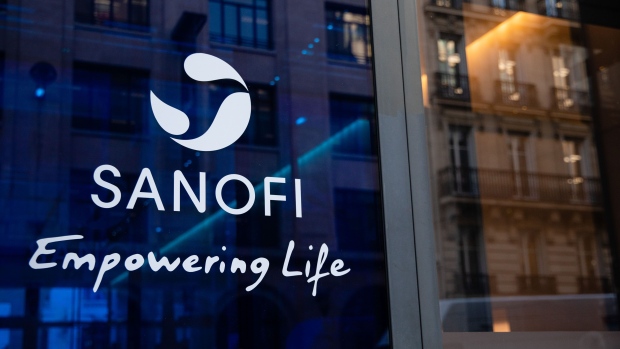 A Sanofi logo sits on the company's headquarters in Paris, France, on Thursday, Feb. 6, 2020. Sanofi’s key eczema and asthma medicine Dupixent is expected to help boost profit in 2020 as Paul Hudson revamps the drugmaker’s strategy in his first full year as chief executive officer. Photographer: Marlene Awaad/Bloomberg