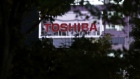 Signage for Toshiba Corp. displayed at the company's headquarters at night in Tokyo, Japan, on Monday, Dec. 19, 2022. Toshiba's shares dropped on a report that the company's preferred bidder may lower its valuation. The iconic Japanese conglomerate has been exploring options for its future including going private. Photographer: Kiyoshi Ota/Bloomberg