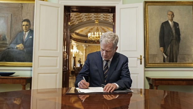 Sauli Niinisto signs Finland’s NATO legislation, in Helsinki, on March 23. Photographer: Roni Rekomaa/Bloomberg