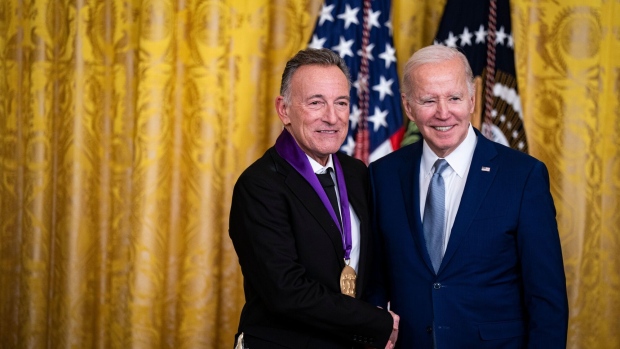 Musician Bruce Springsteen receives the 2021 National Medal of Arts from US President Joe Biden during a ceremony at White House in Washington, on March 21. Photographer: Al Drago/Bloomberg