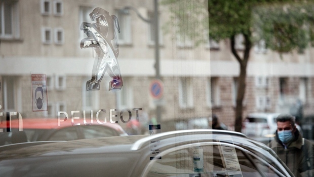 A Peugeot lion logo inside a Peugeot automobile showroom, operated by Stellantis NV, in Paris, France, on Tuesday, May 4, 2021. Stellantis reports first quarter earnings on May 5. Photographer: Cyril Marcilhacy/Bloomberg