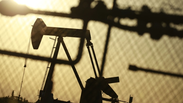 An oil pump jack at the New Harmony Oil Field in Grayville, Illinois, US, on Sunday, June 19, 2022. Top Biden administration officials are weighing limits on exports of fuel as the White House struggles to contain gasoline prices that have topped $5 per gallon. Photographer: Luke Sharrett/Bloomberg