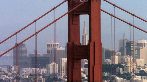 The Transamerica Pyramid Building is framed by San Francisco, California's Golden Gate Bridge on Saturday, January 31, 2004.