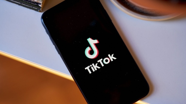 The TikTok logo on a smartphone arranged in the Brooklyn borough of New York, US, on Thursday, March 9, 2023. The US is moving closer to restricting access to the popular video-sharing app TikTok, with Senate Intelligence Committee Chairman Mark Warner set to unveil a bill Tuesday that the Biden administration is poised to support, according to people familiar with the issue. Photographer: Gabby Jones/Bloomberg