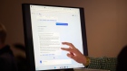 An attendee interacts with the AI-powered Microsoft Bing search engine and Edge browser during an event at the company's headquarters in Redmond, Washington, US, on Tuesday, Feb. 7, 2023. Microsoft unveiled new versions of its Bing internet-search engine and Edge browser powered by the newest technology from ChatGPT maker OpenAI.