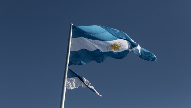 The Argentinian flag during La Exposicion Rural agricultural and livestock show in Buenos Aires, Argentina, on Friday, July 29, 2022. The Rural Exposition brings together commercial and livestock exhibitors as well as producers, entrepreneurs and professionals from various agro-industrial businesses. Photographer: Anita Pouchard Serra/Bloomberg