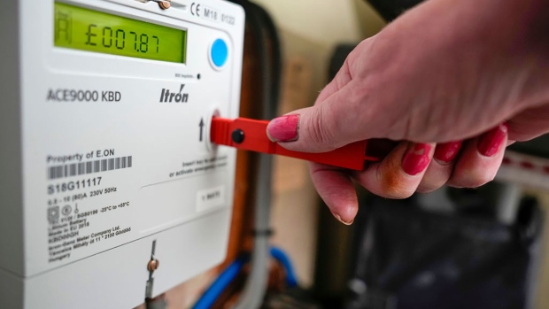 BIRMINGHAM, ENGLAND - FEBRUARY 07: In this photo illustration a prepay electricity key sits in a prepayment electricity meter in a rented home on February 07, 2023 in Birmingham, England. Ofgem has ordered all UK energy companies to suspend the practice of forcibly installing prepayment meters and will report back to the Business Secretary today. (Photo illusttration by Christopher Furlong/Getty Images) Photographer: Christopher Furlong/Getty Images Europe