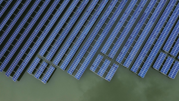 Photovoltaic panels stand in a floating solar farm in this aerial photograph taken on the outskirts of Ningbo, Zhejiang Province, China, on Wednesday, April 22, 2020. China's top leaders softened their tone on the importance of reaching specific growth targets this year during the latest Politburo meeting on April 17, saying the nation is facing "unprecedented" economic difficulty and signaling that more stimulus was in the works. Photographer: Qilai Shen/Bloomberg