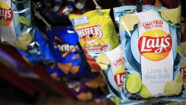 Bags of PepsiCo Inc. brand Lay's potato chips for sale at a grocery store in Bagdad, Kentucky, U.S., on Friday, April 9, 2021. PepsiCo Inc. is scheduledto release earnings figures on April 15.