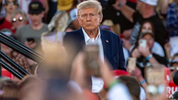 former us president donald trump exits the stage after speaking at a campaign event in waco texas us on saturday march 25 2023 a defiant trump railed against the investigations he faces and predicted he d prevail during a rally in waco that may be the former president s last public appearance before he faces potential criminal charges