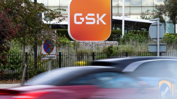 The GSK Plc sign outside the headquarters of the company in the Brentford district of London, UK.