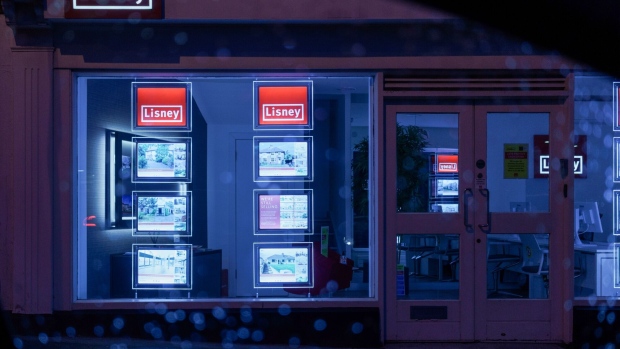 Residential properties listed in the window of a Lisney Ltd. estate agents in Dundrum Village, Dublin, Ireland, on Monday, May 10, 2021. The mass purchase of affordable houses — on the market for about 400,000 euros ($490,000) — set off a public firestorm and highlights the growing tension over the squeeze in urban housing and the role of large investors. Photographer: Paulo Nunes dos Santos/Bloomberg