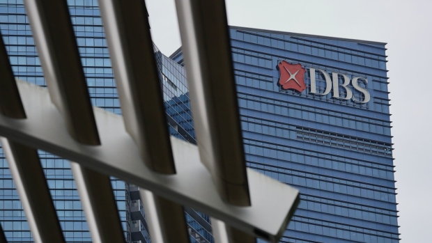 Signage of DBS Bank Ltd. at its company head office in Singapore, on Monday, Feb. 13, 2023. DBS Group Holdings Ltd. has about a S$1.3 billion ($976 million) exposure to Adani Group, of which S$1 billion is from a cement firm acquisition financing and the remaining S$300 million is from other Adani firms, its Chief Executive Officer Piyush Gupta said at a briefing Monday. Photographer: Suhaimi Abdullah/Bloomberg