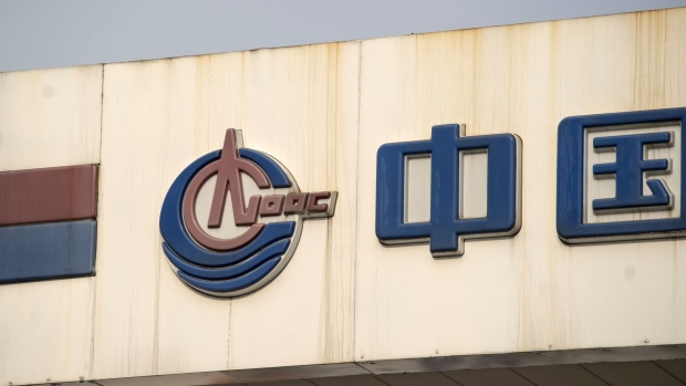 Signage atop a Cnooc Ltd. filling station in Shanghai, China, on Monday, March 27, 2023. Cnooc is scheduled to release earnings results on March 29. Photographer: Qilai Shen/Bloomberg