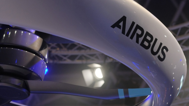 The Airbus SE logo sits an on Airbus PopUp Next passenger drone concept vehicle, developed by Airbus SE, Audi AG and Italdesign Giugiaro SpA, during Amsterdam Drone Week in Amsterdam, Netherlands, on Tuesday, Nov. 27, 2018. Amsterdam Drone Week, the first official European platform for users, manufacturers, services and regulators, showcases the latest technology in the unmanned aircraft system (UAS) industry. Photographer: Yuriko Nakao/Bloomberg