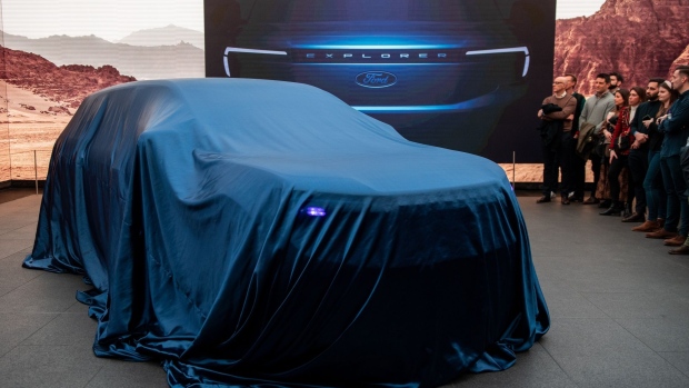 Ford’s new Explorer electric sport utility vehicle under cover during its unveiling this month in London.