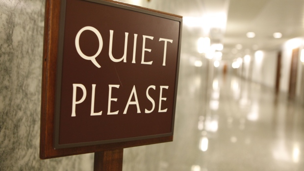 Quiet Please sign in the Dirksen Senate Office building. Photo: Rich Clement/Bloomberg
