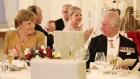 Former German Chancellor Angela Merkel and King Charles III attend a state banquet at Schloss Bellevue presidential palace on March 29.