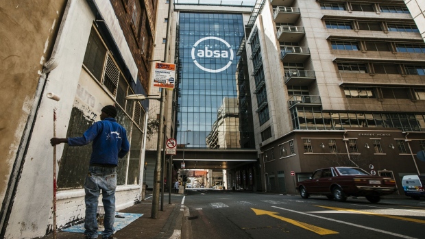 A new corporate logo stands on the exterior of the Absa Group Ltd. headquarters office in Johannesburg, South Africa, on Tuesday, Aug. 7, 2018. Barclays Africa Group Ltd. has ditched the name to revert to Absa Group Ltd. as it severs ties with Barclays Plc, after the London-based company sold down the controlling stake it bought in 2005. Photographer: Waldo Swiegers/Bloomberg