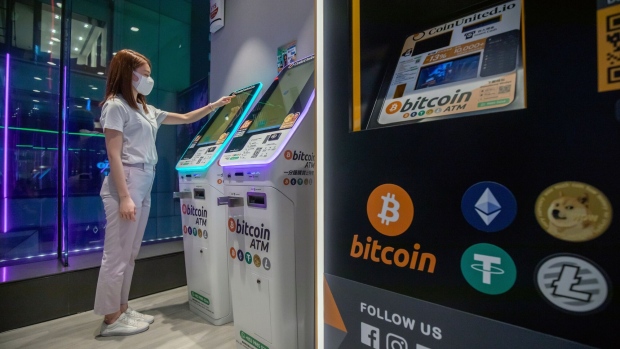 Cryptocurrency ATMs at an exchange in Hong Kong, China. Photographer: Paul Yeung/Bloomberg