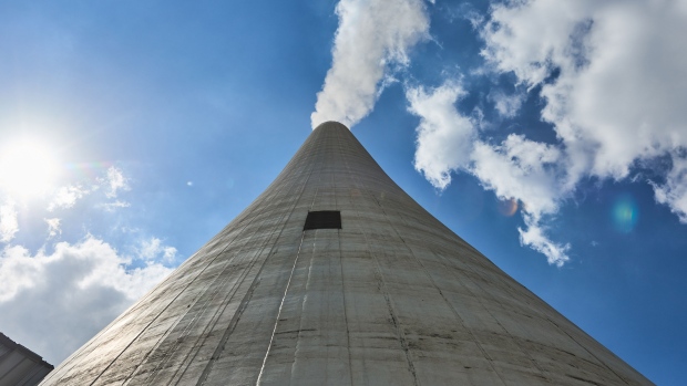Vapour rises from a chimney at the Eskom Holdings SOC Ltd. Tutuka coal-fired power station in Mpumalanga.