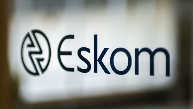 A company logo is displayed during a news conference to announce the Eskom Holdings SOC Ltd. full year results at their headquarters in Johannesburg, South Africa, on Tuesday, July 30, 2019. Eskom reported a record loss of 20.7 billion rand.