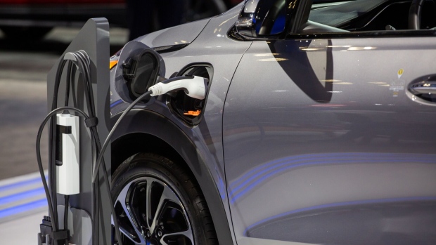 The charging port of a Chevrolet Bolt electric utility vehicle (EUV) during the 2022 New York International Auto Show (NYIAS) in New York, U.S., on Thursday, April 14, 2022. The NYIAS returns after being cancelled for two years due to the Covid-19 pandemic.