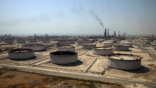 Crude oil storage tanks at the Juaymah Tank Farm in Saudi Aramco's Ras Tanura oil refinery and oil terminal in Ras Tanura, Saudi Arabia, on Monday, Oct. 1, 2018. Saudi Arabia is seeking to transform its crude-dependent economy by developing new industries, and is pushing into petrochemicals as a way to earn more from its energy deposits.