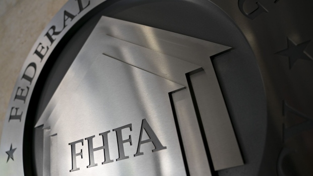 The seal of the Federal Housing Finance Agency (FHFA) is displayed outside the organization's headquarters in Washington, D.C., U.S., on Wednesday, March 20, 2019. President Donald Trump's pick to lead Fannie Mae and Freddie Macs regulator pledged to work with Congress on overhauling the companies, while downplaying controversial positions he's previously laid out on everything from the 30-year-mortgage to affordable housing initiatives. Photographer: Andrew Harrer/Bloomberg