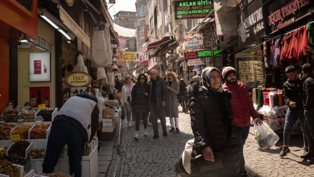Shoppers walk down a busy retail street in Istanbul, Turkey on Thursday, April 6, 2023. Treasury & Finance Minister Nureddin Nebati advised citizens to switch up their eating habits, highlighting that lamb is cheaper than beef and better suited to Turkey’s geography, with the central bank citing red meat and processed meat products as the primary reasons behind food price increases. Photographer: Nicole Tung/Bloomberg